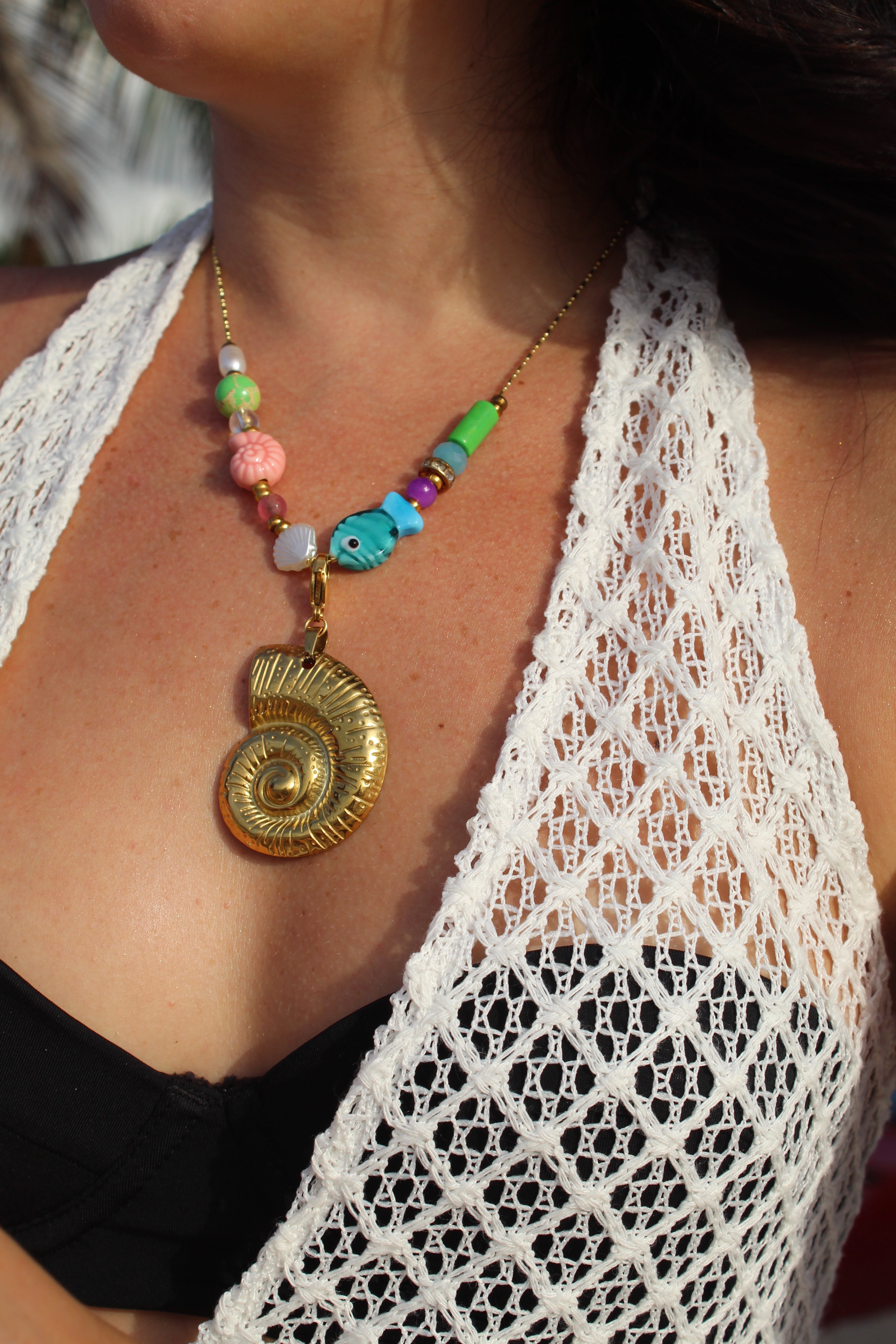 Golden shell charm