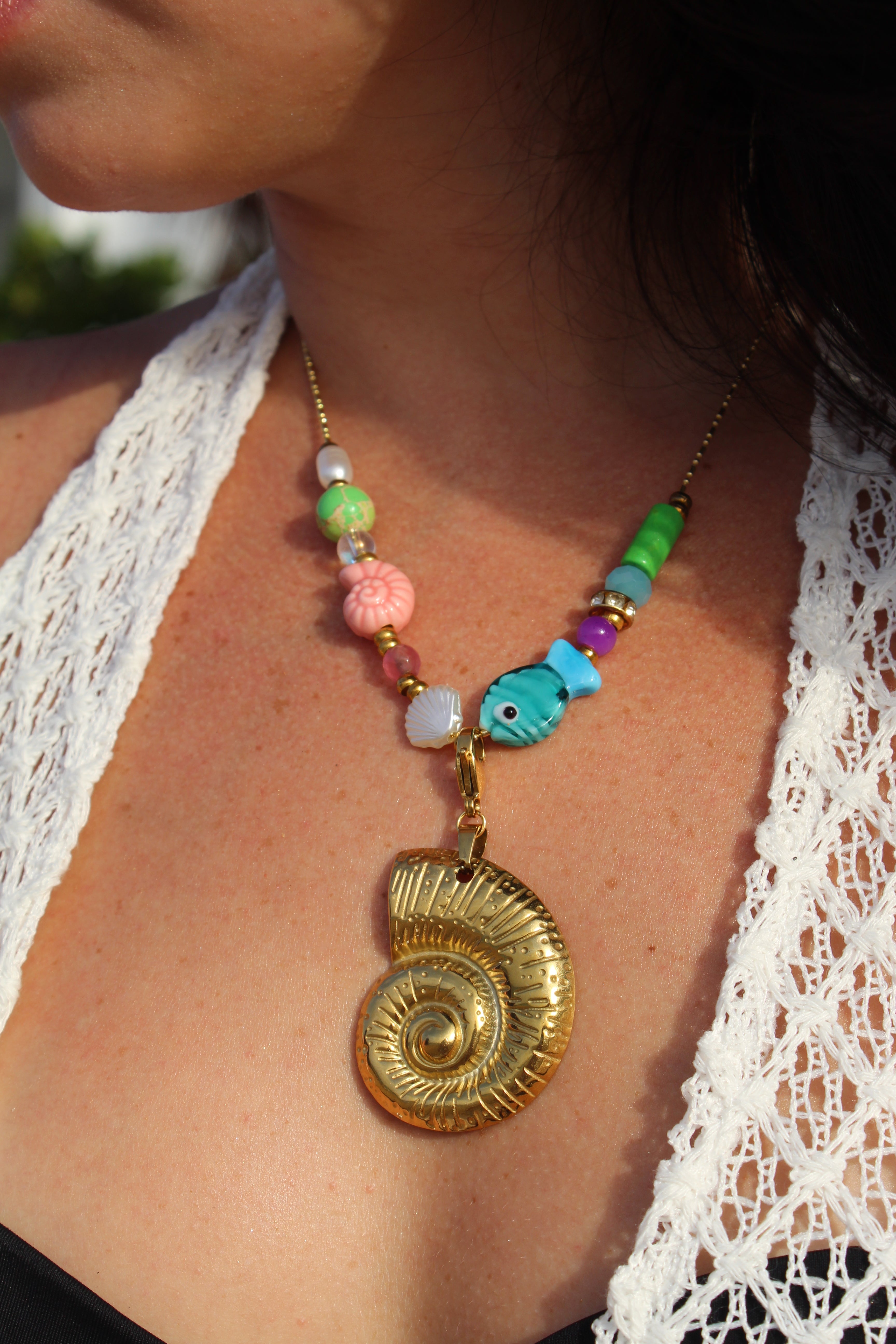 Golden shell charm