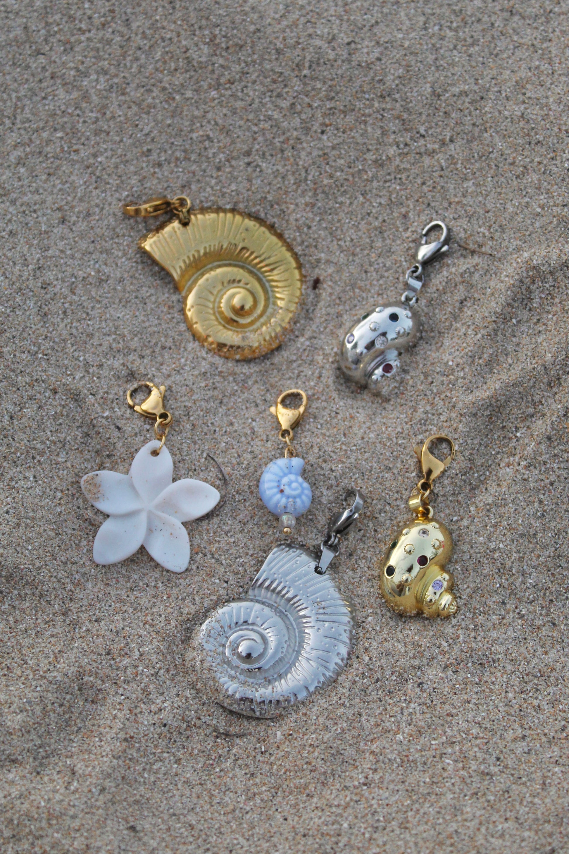 Shiny silver shell charm