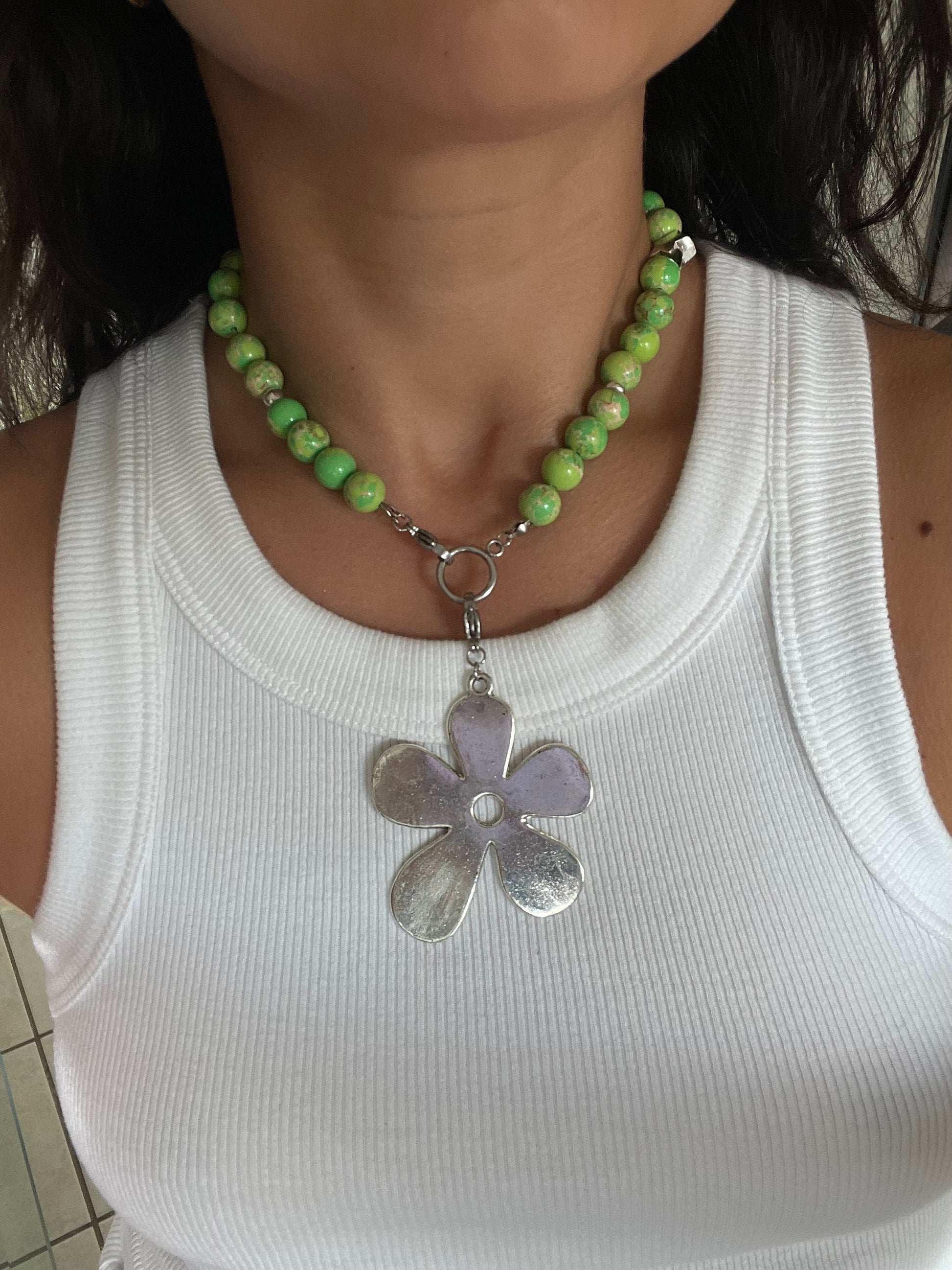 Silvery flower charm